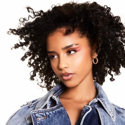 Tyla: Radiant Curls & Denim Cool 4K 5K Wallpaper