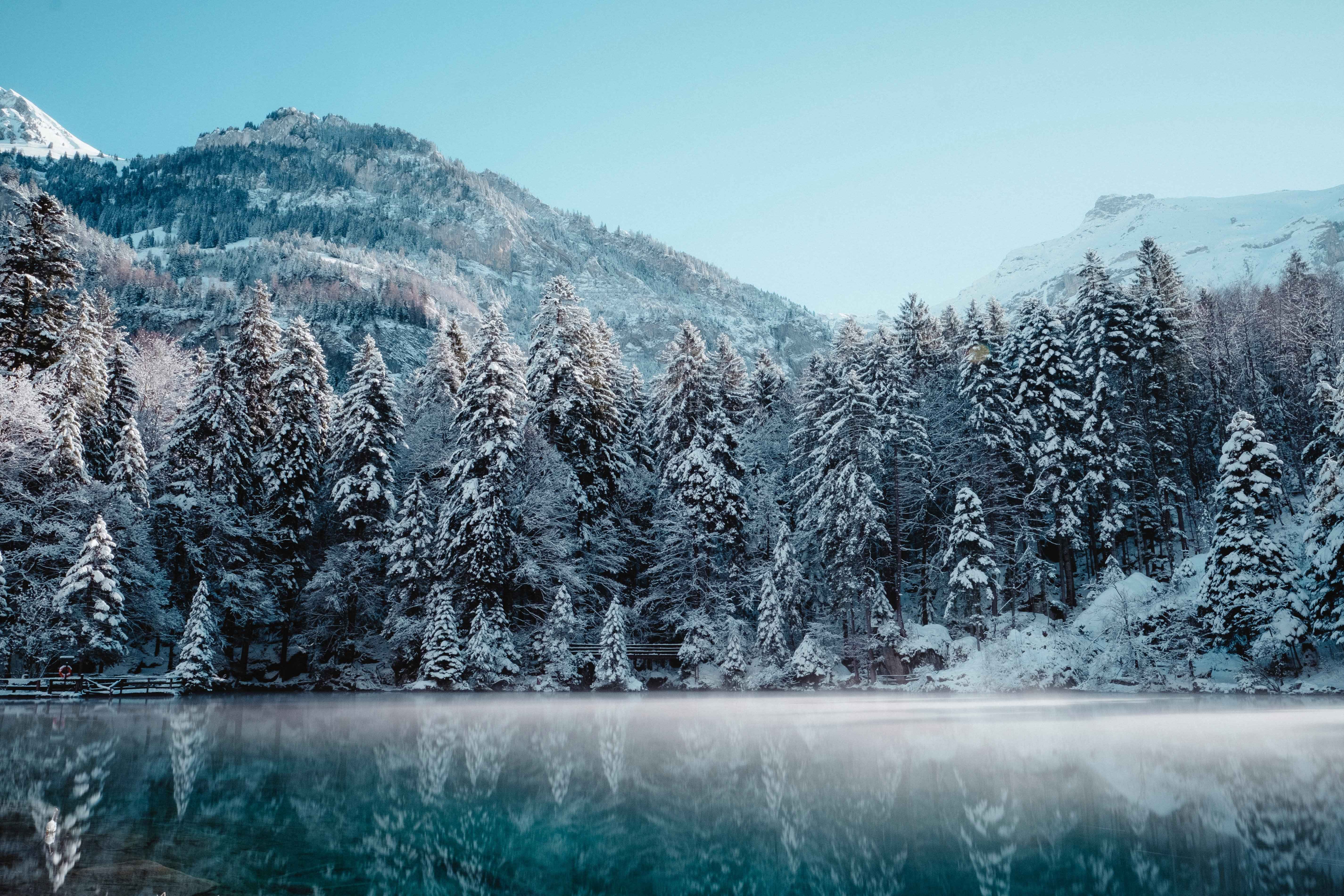 Frozen Glacier Lake: Winter's Silent Embrace 4K 5K Wallpaper