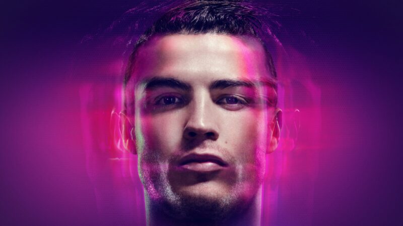 Cristiano: Neon Glow of Football Stardom 4K Wallpaper