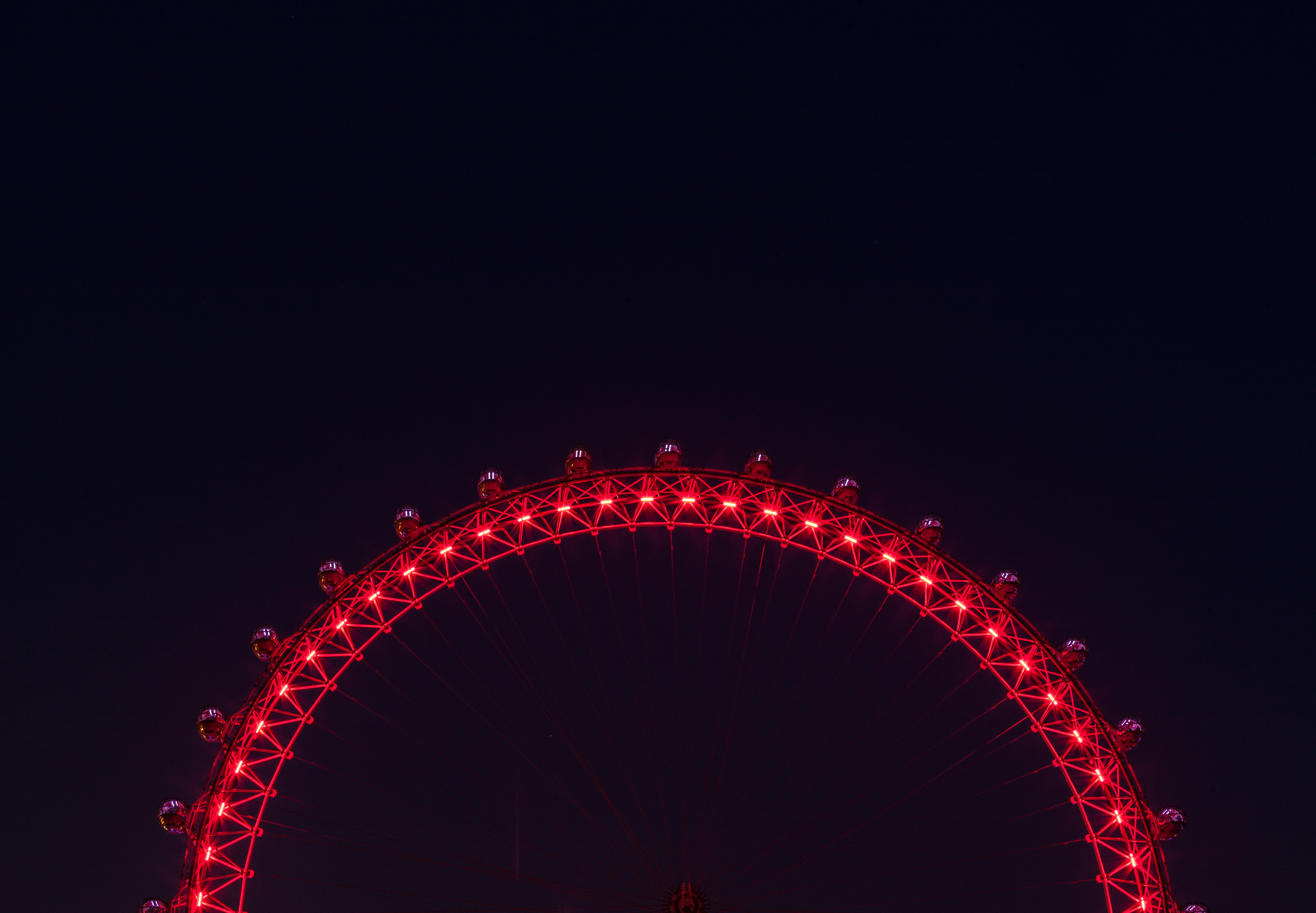 London Eye: A Crimson Arch in Night's Embrace 4K 5K Wallpaper