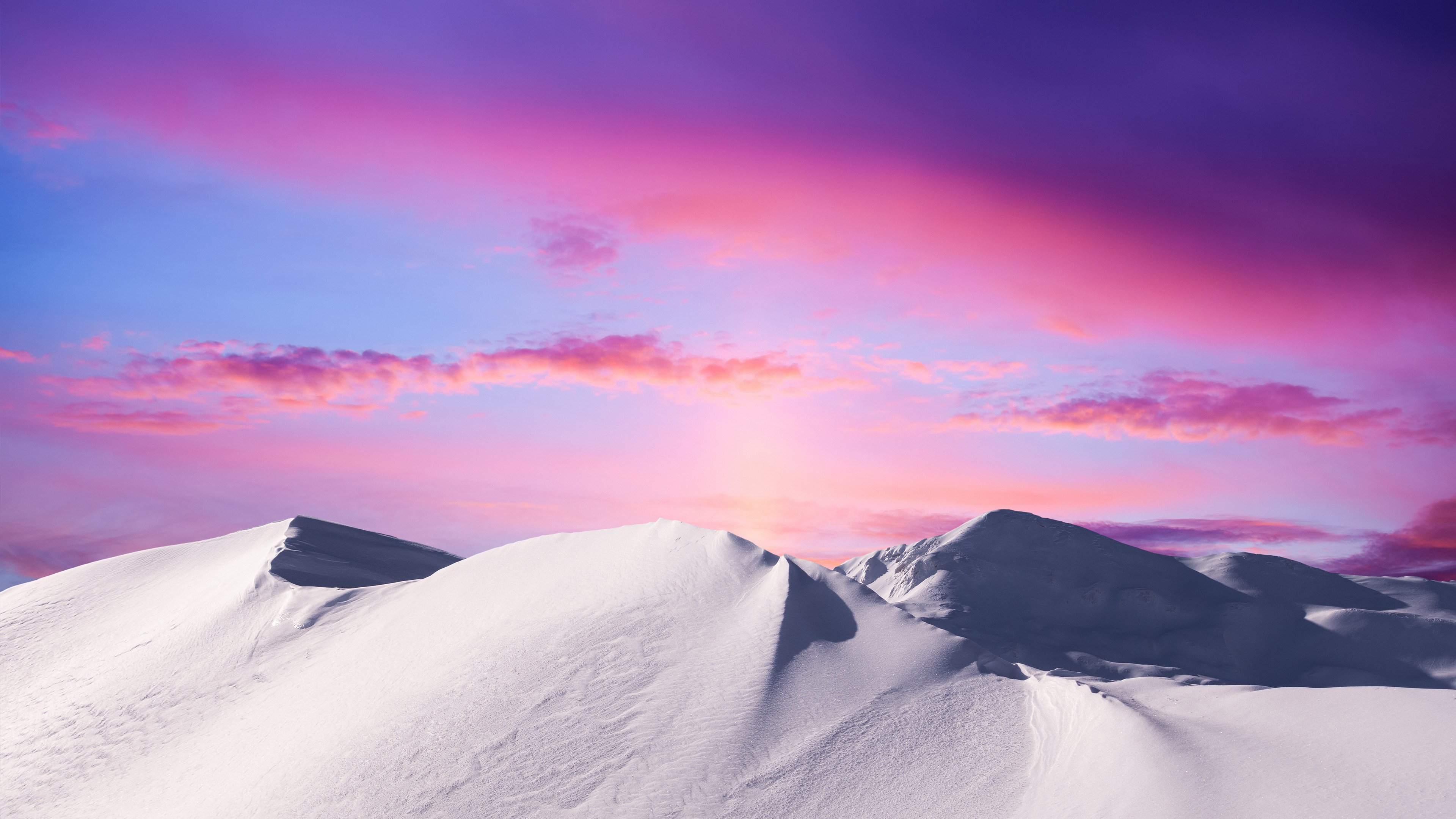 Snowy Peaks Under Twilight's Palette 4K Wallpaper