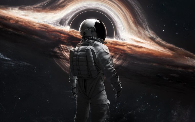 Astronaut's Cosmic Journey to Gargantua 4K 5K Wallpaper