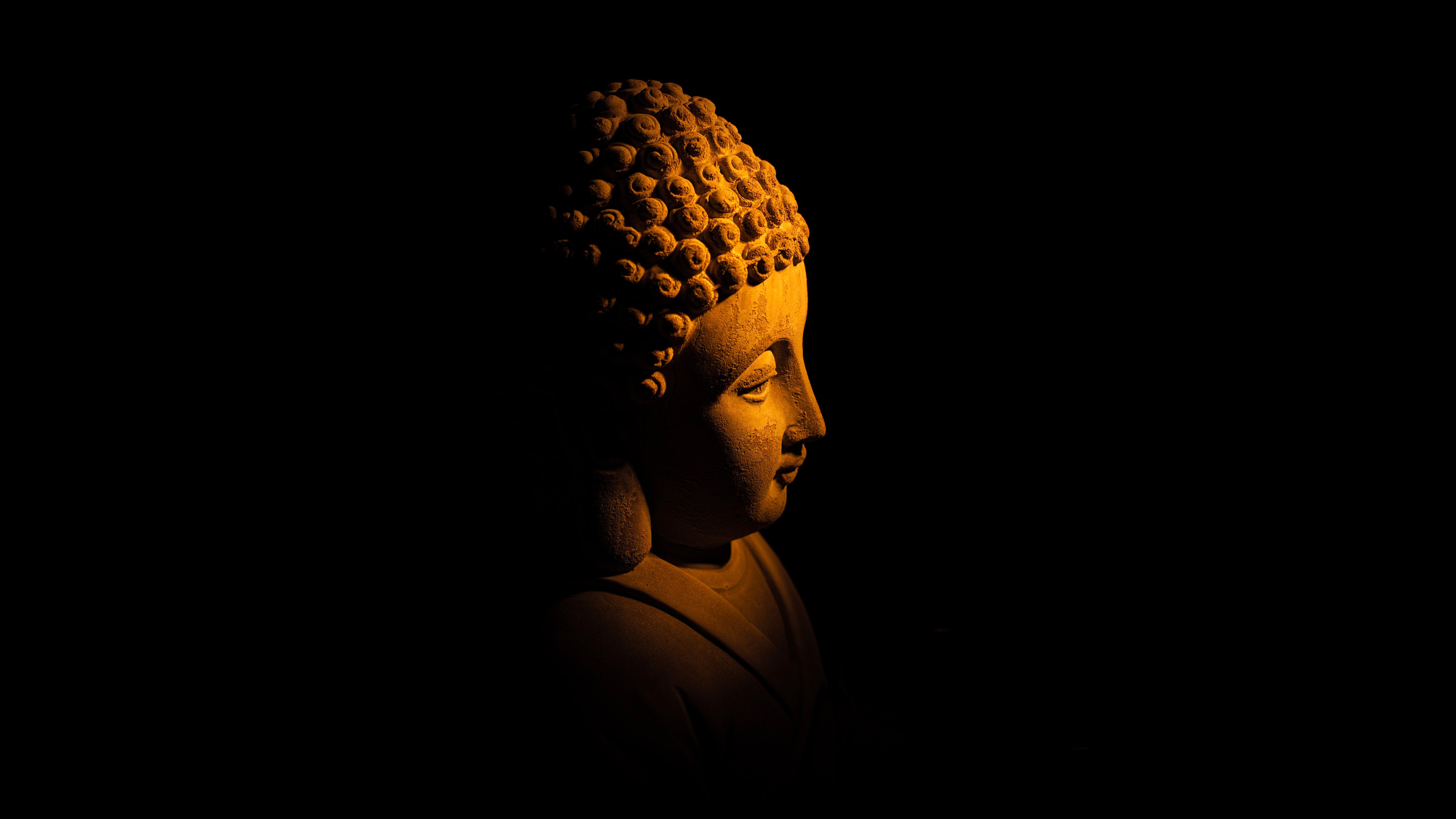 Enlightened Gautama Buddha in Golden Hue 4K 5K Wallpaper