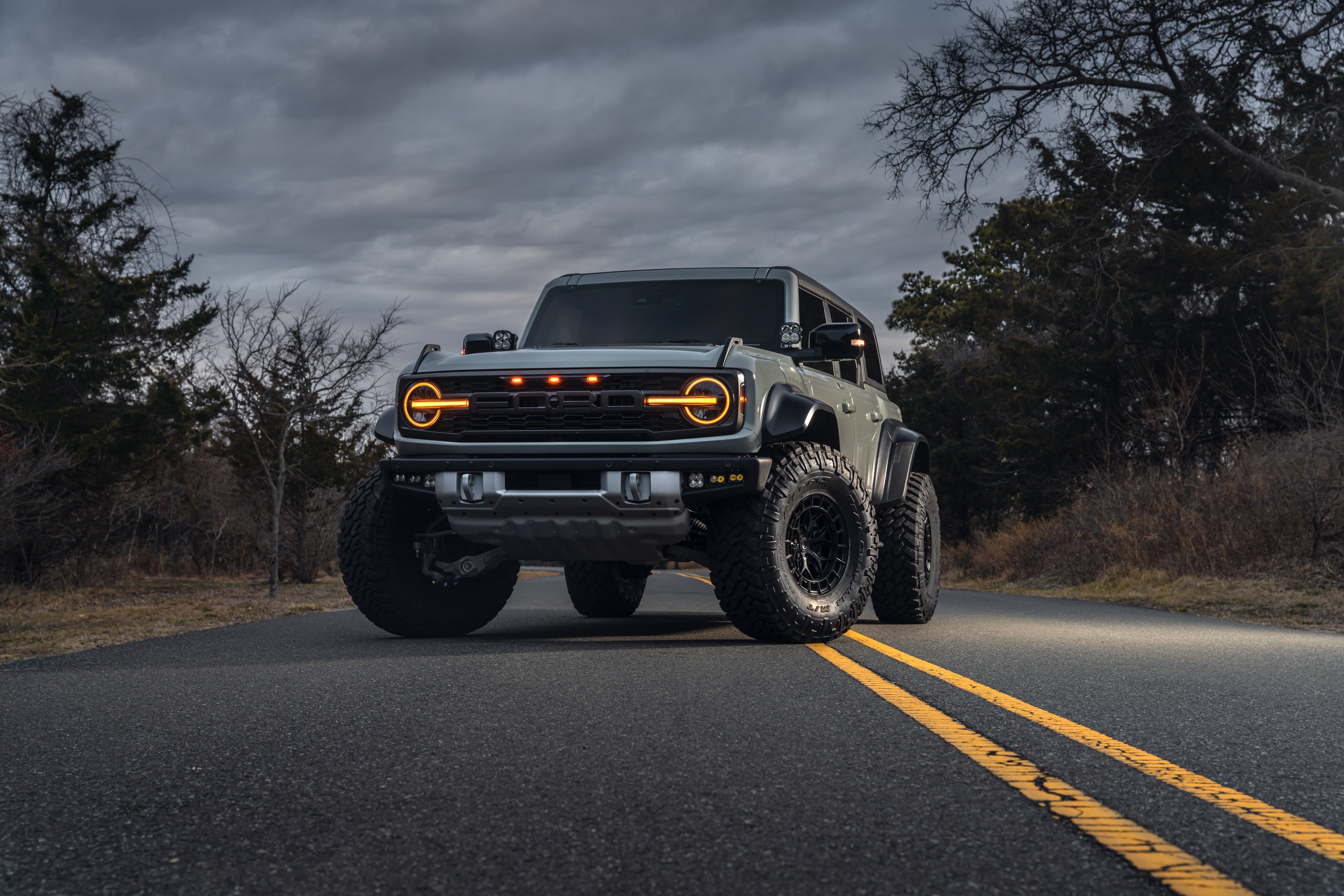 Bronco Raptor: Tarmac Titan 4K Wallpaper