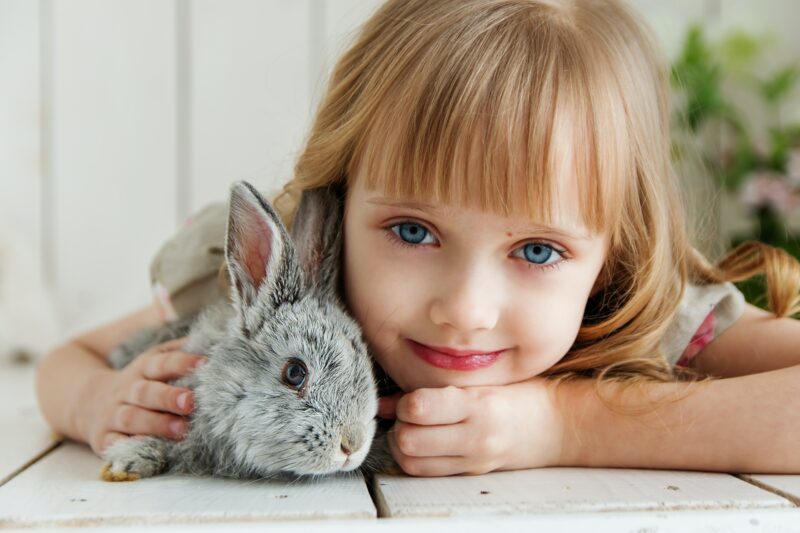 Smiling Girl and Her Adorable Bunny Friend 4K 5K Wallpaper