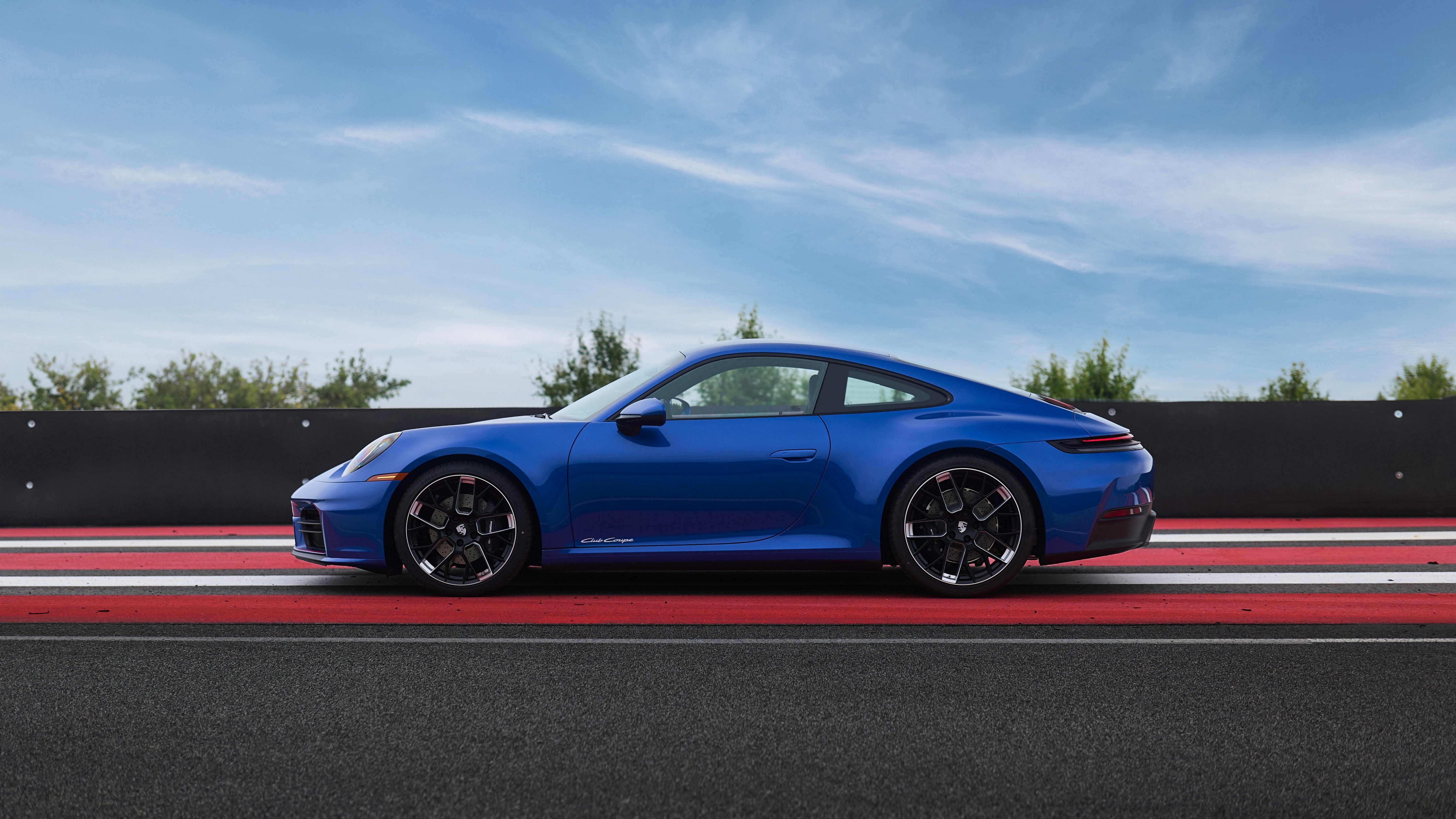 Porsche 911 Carrera: Racing Blue Elegance 4K 5K Wallpaper