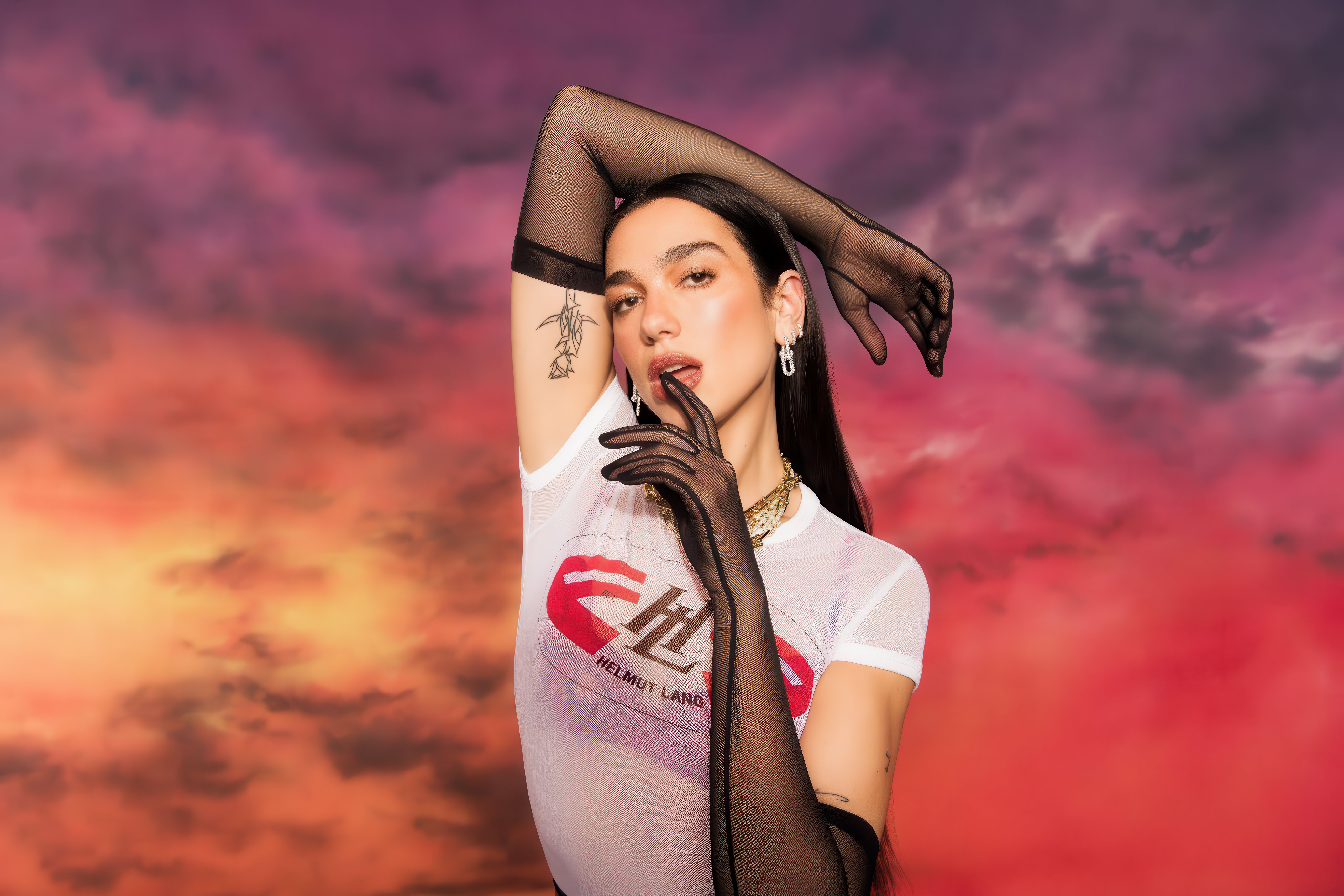 Dua Lipa's Sunset Glamour Pose 4K 5K Wallpaper