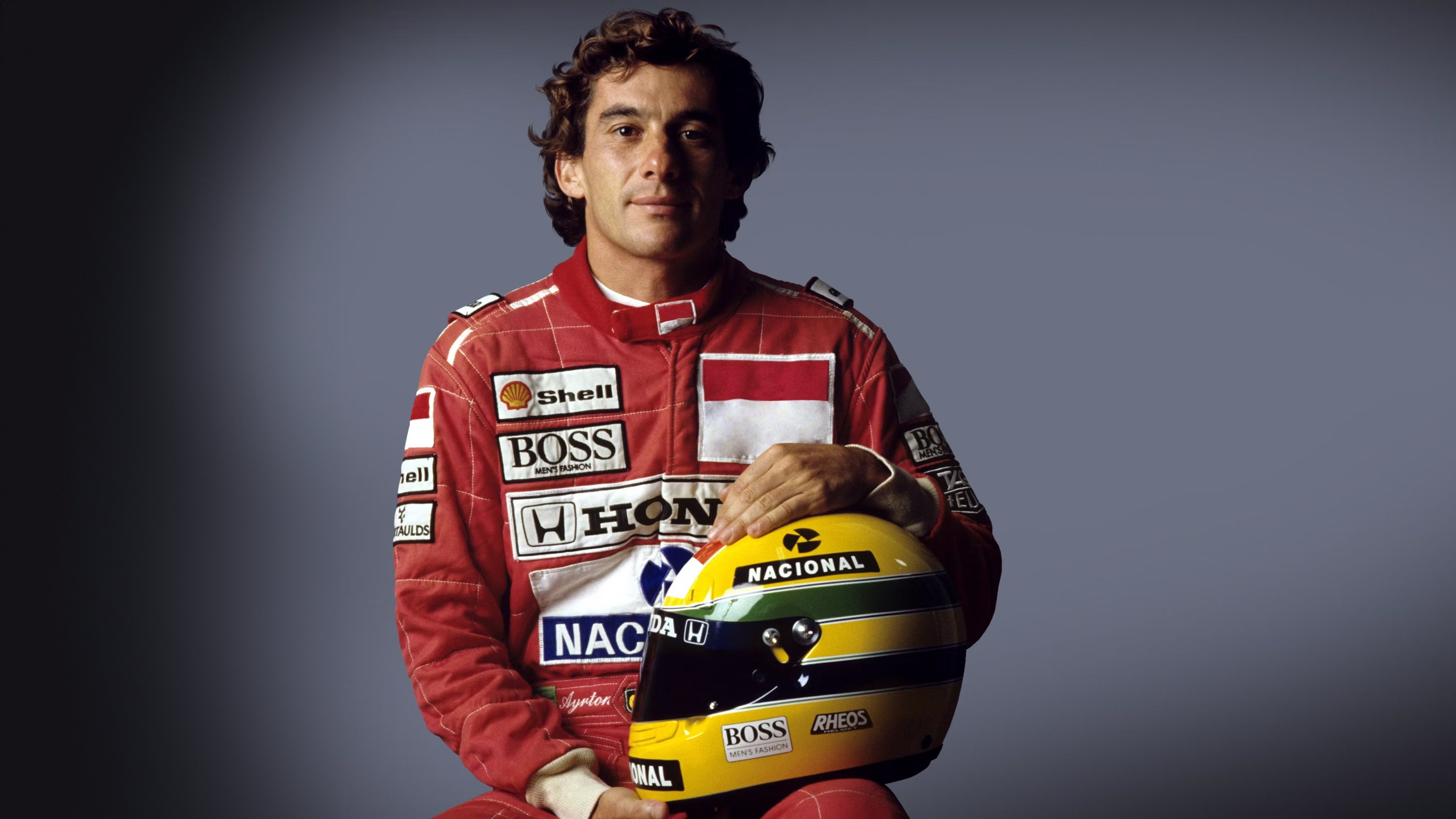 Senna: Racing Legend in Red 4K Wallpaper