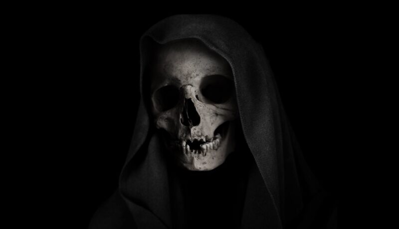 Grim Reaper's Haunting Skull Emerges 4K Wallpaper