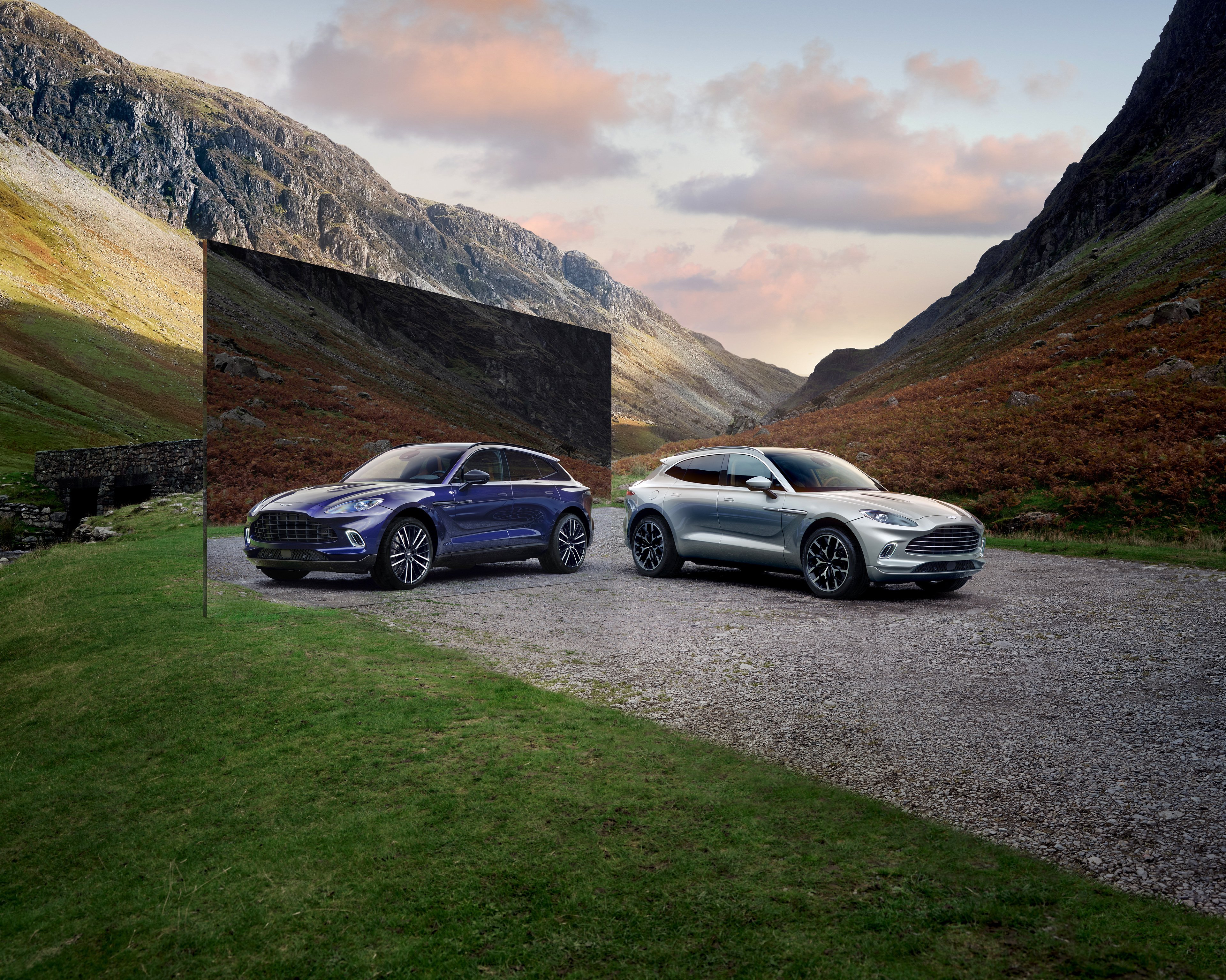 Aston Martin DBX: Hybrid Power Meets Mountain Majesty 4K Wallpaper