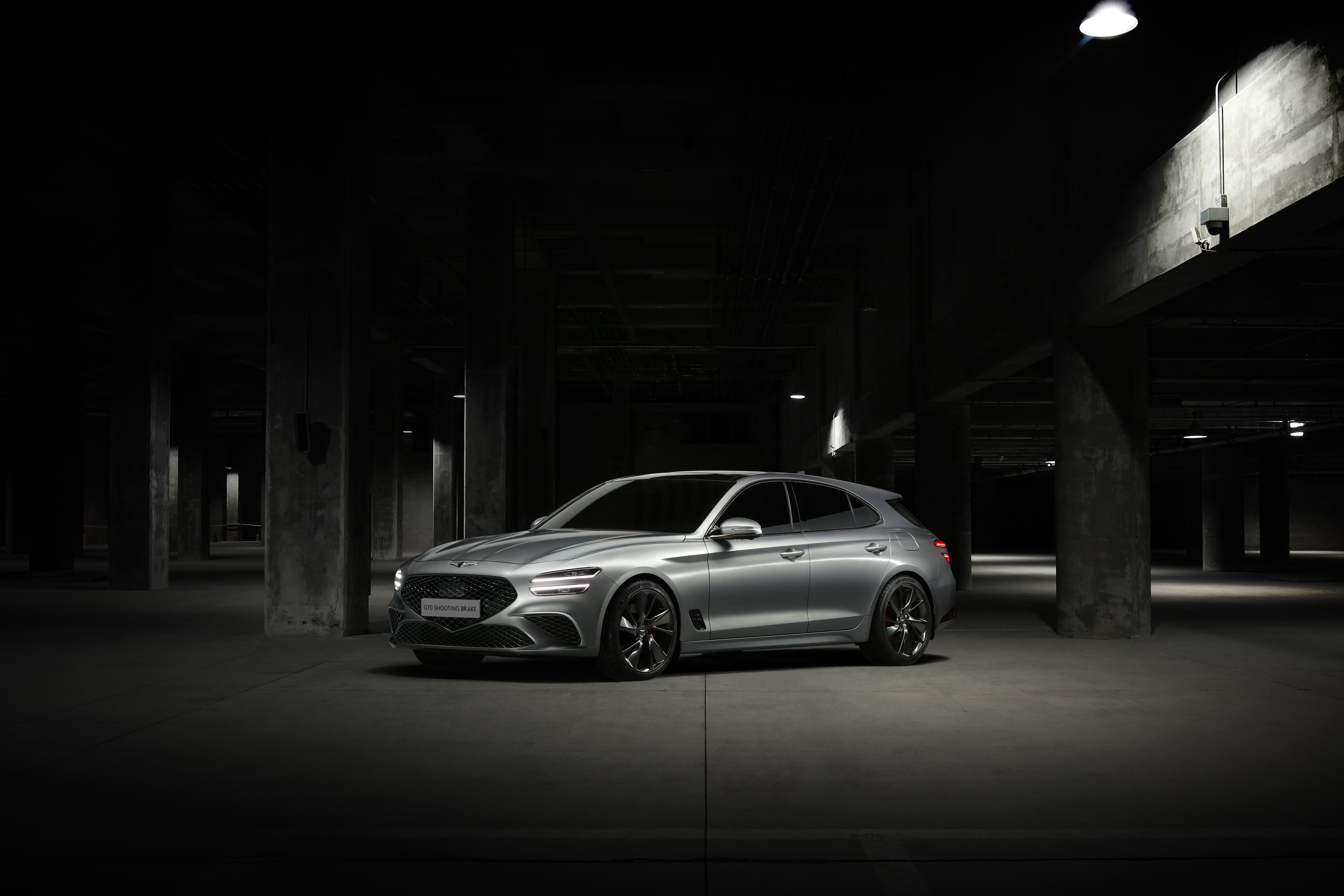 Genesis G70: Sleek Sedan in Shadowy Garage 4K 5K 8K Wallpaper