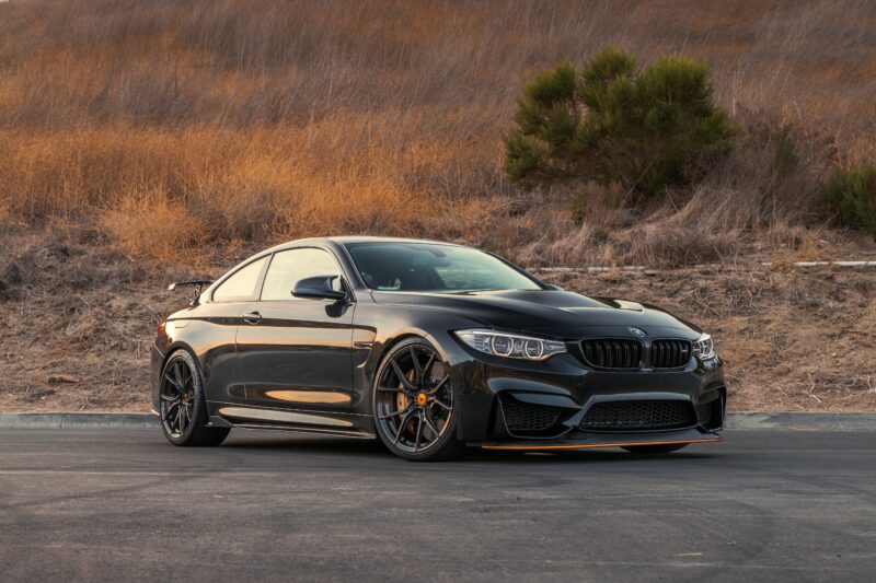 Sinister Black BMW M4: Stance & Power 4K 5K Wallpaper