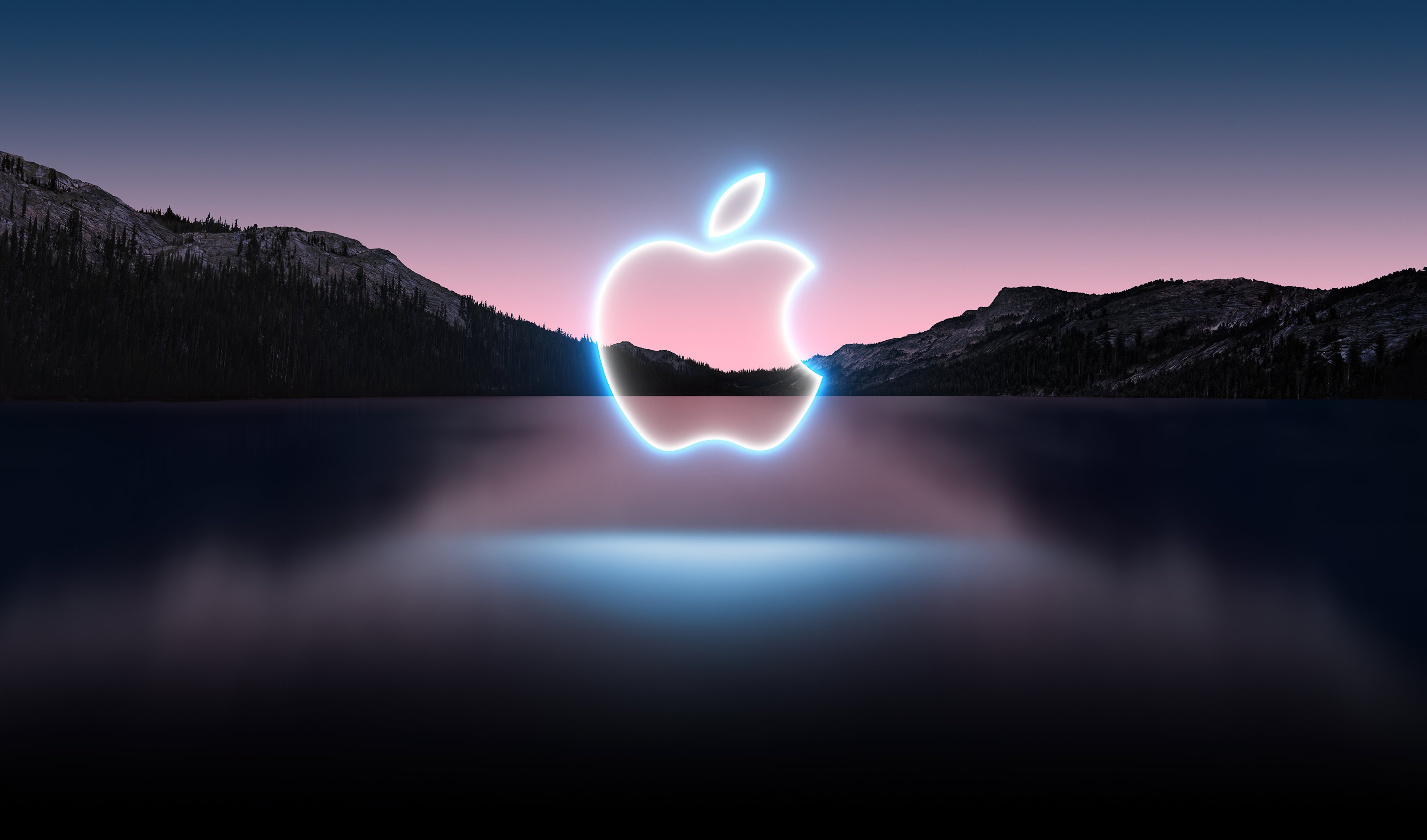 Apple Logo Illuminates Mountain Lake 4K Wallpaper