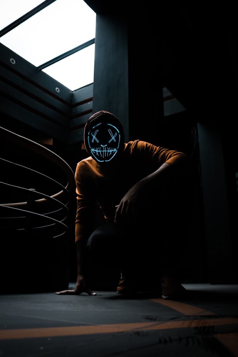 Anonymous LED Skull Mask in Shadow 4K Wallpaper